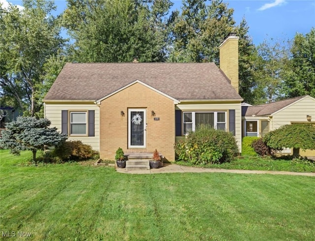 view of front of home with a front yard