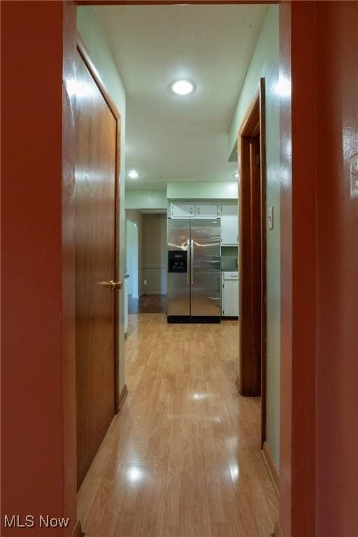 hallway featuring light wood-type flooring