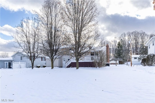 view of yard covered in snow