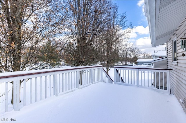 view of snow covered deck