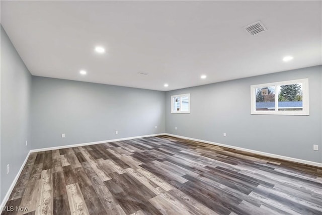 empty room featuring hardwood / wood-style flooring