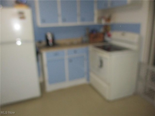 kitchen featuring blue cabinetry