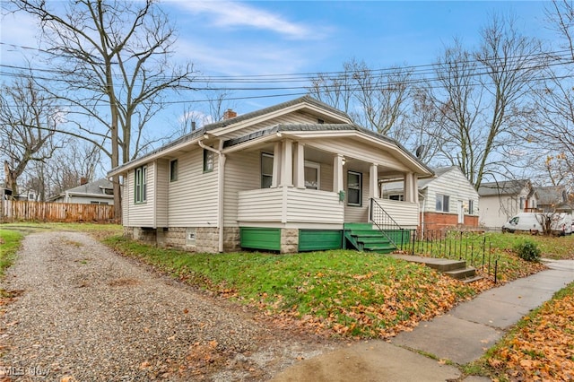 bungalow-style home with a porch