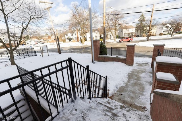 view of yard covered in snow