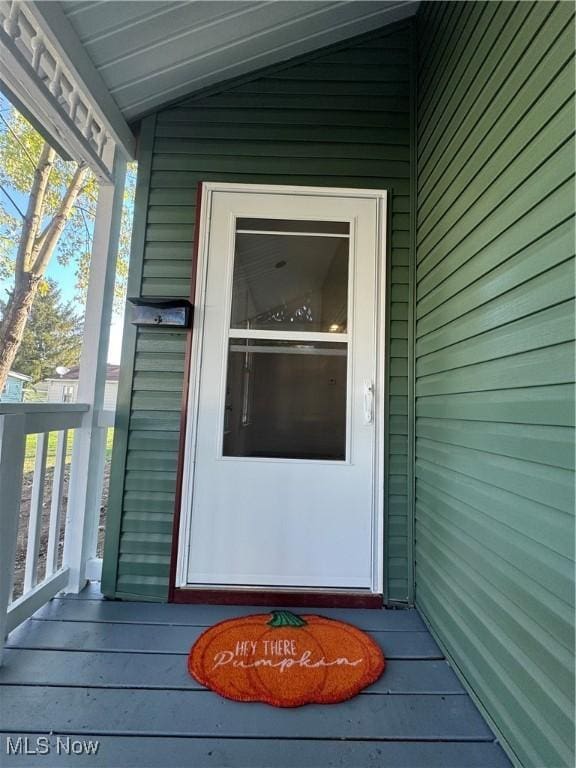 entrance to property with covered porch