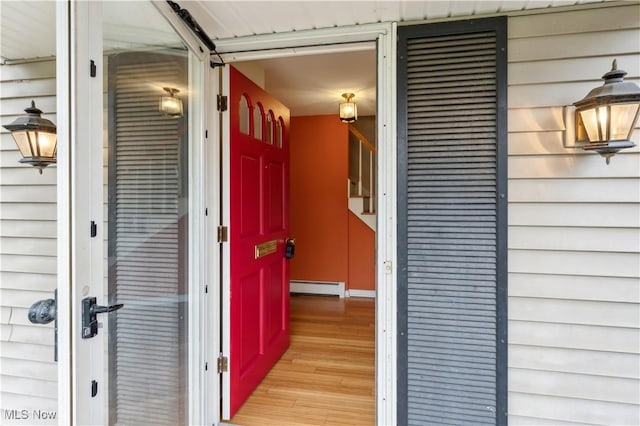 property entrance with baseboard heating