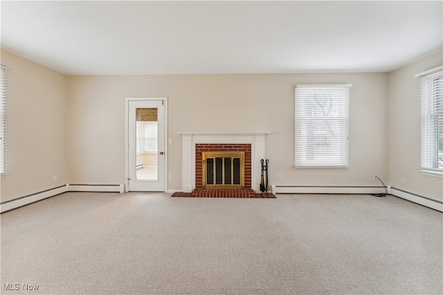 unfurnished living room with a fireplace and carpet floors