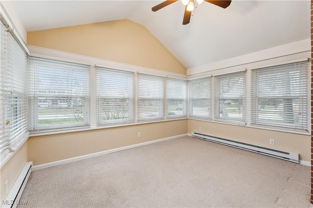 unfurnished sunroom featuring ceiling fan, lofted ceiling, and a baseboard heating unit