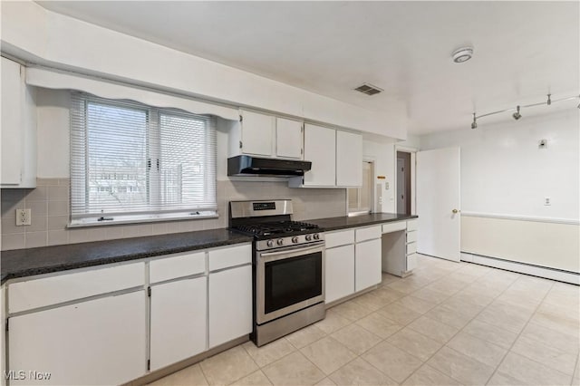 kitchen featuring stainless steel gas range, tasteful backsplash, baseboard heating, light tile patterned flooring, and white cabinets