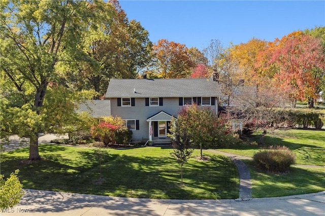 colonial house with a front lawn