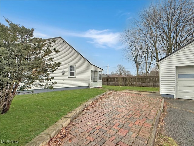 view of patio featuring a garage