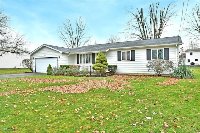 ranch-style house with a front lawn and a garage