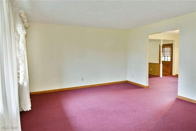 view of carpeted spare room