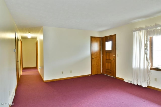 empty room with carpet floors