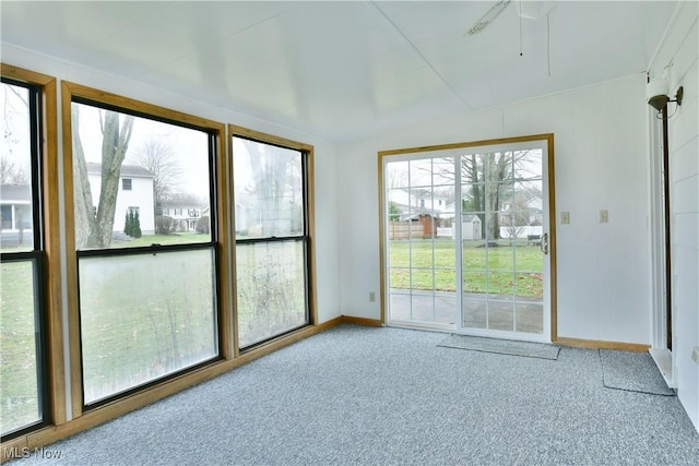 unfurnished sunroom featuring a healthy amount of sunlight