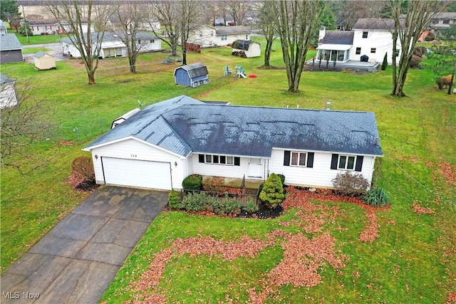 view of front of property with an outbuilding and a garage