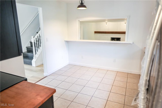 interior space with light tile patterned floors