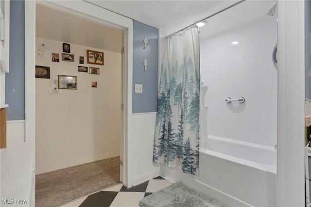 bathroom with shower / tub combo