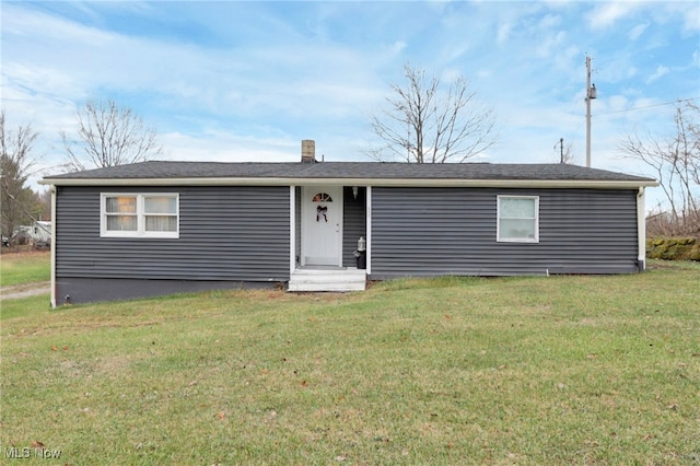 view of front facade with a front lawn