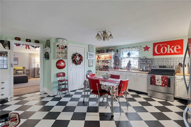 dining room featuring a notable chandelier