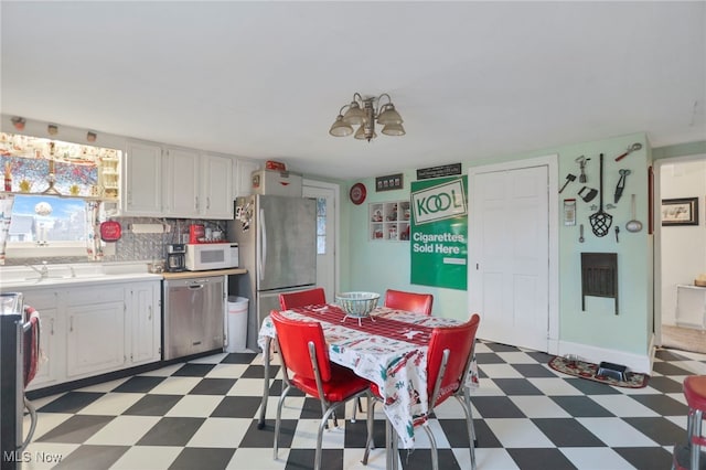 dining area featuring a chandelier