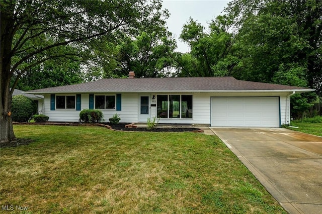 ranch-style house with a front lawn and a garage