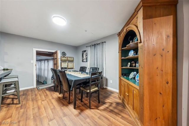 dining room featuring light hardwood / wood-style flooring