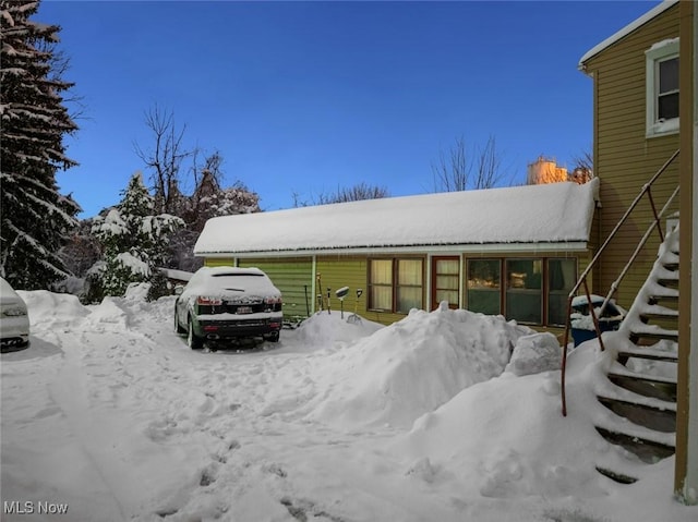 view of snow covered property