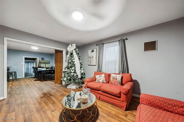 living room with hardwood / wood-style floors