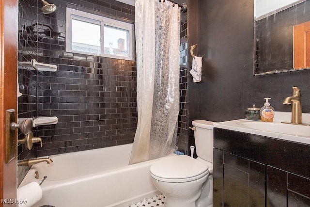 full bathroom featuring tile patterned flooring, vanity, toilet, and shower / bath combo with shower curtain