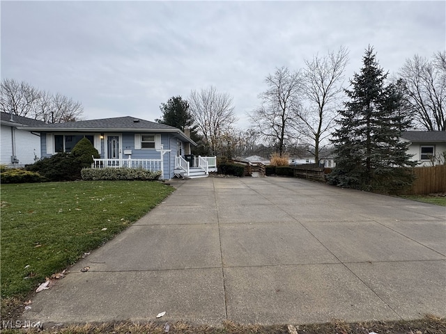 view of home's exterior with a lawn