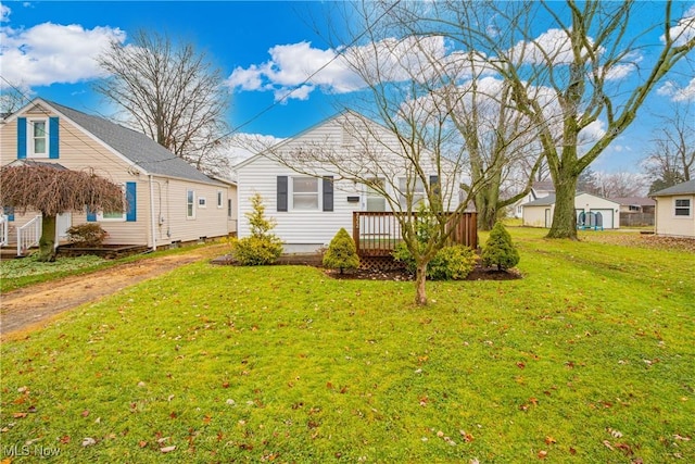 view of yard with a wooden deck