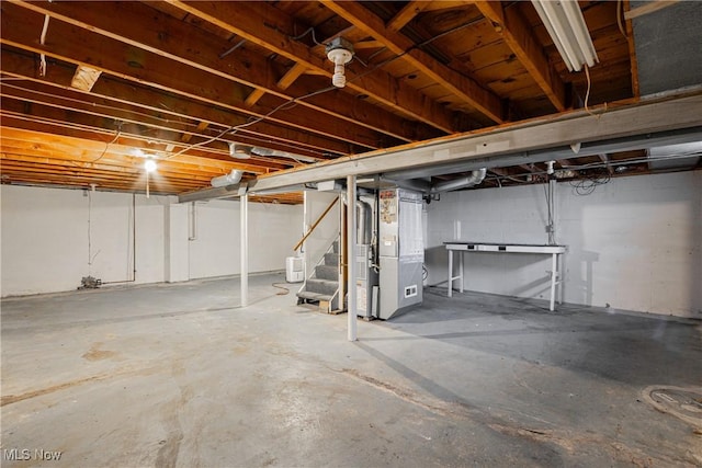 basement featuring heating unit