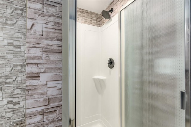 bathroom with an enclosed shower