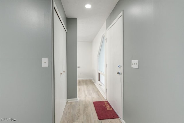 hallway featuring light hardwood / wood-style flooring