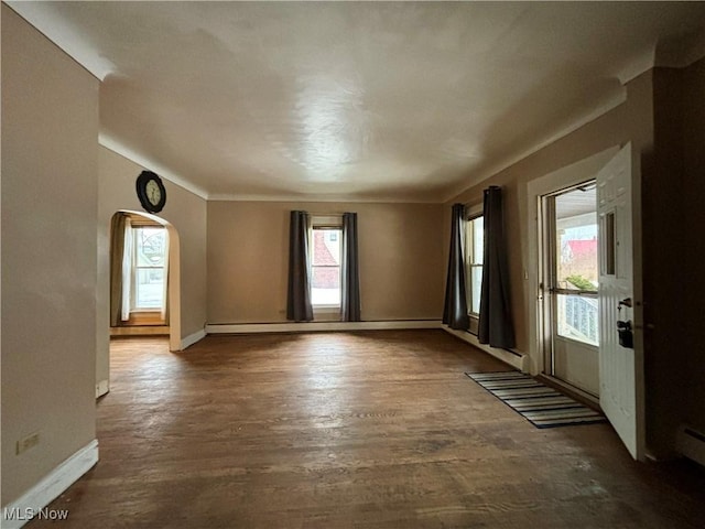 spare room featuring dark hardwood / wood-style flooring