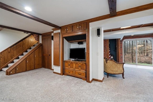 unfurnished living room with light carpet and beam ceiling