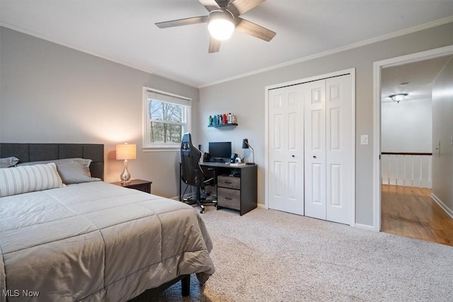 bedroom featuring carpet flooring, ceiling fan, and crown molding