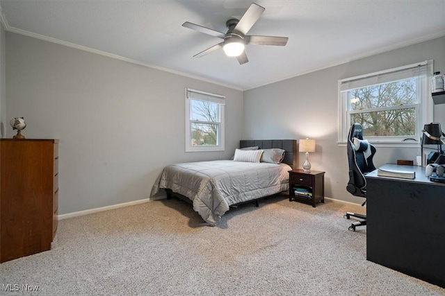 bedroom with carpet flooring, multiple windows, and ceiling fan