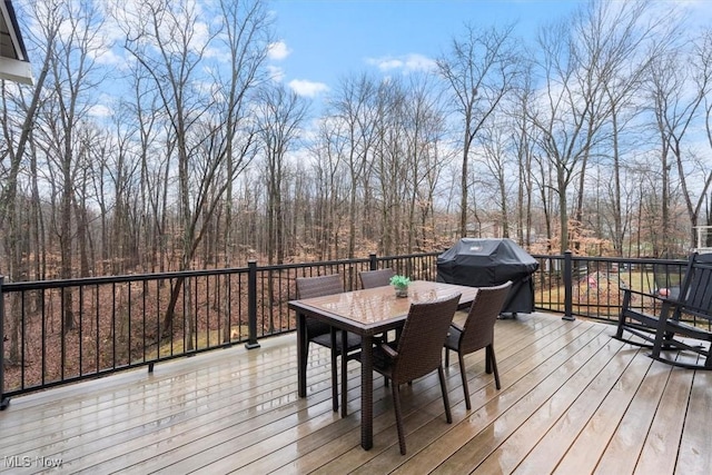 wooden deck featuring grilling area