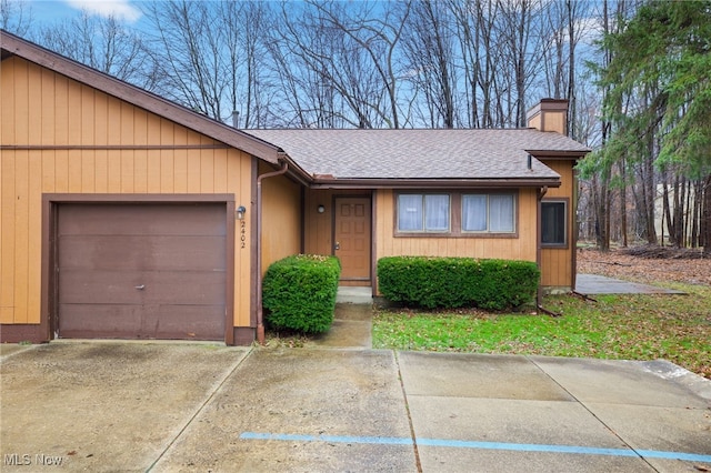 single story home with a garage