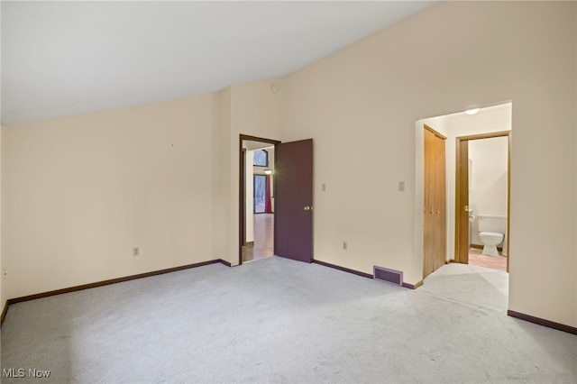 spare room with light colored carpet