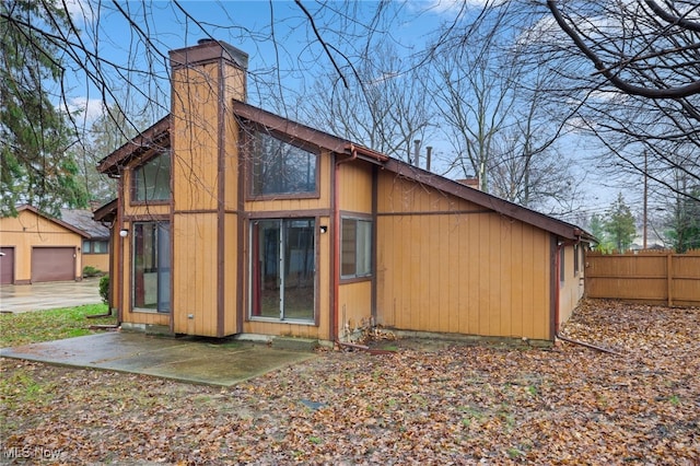 back of house featuring a patio area