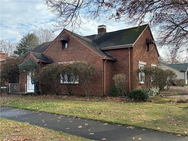 exterior space featuring a lawn