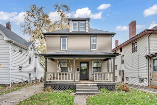 view of front of property featuring covered porch