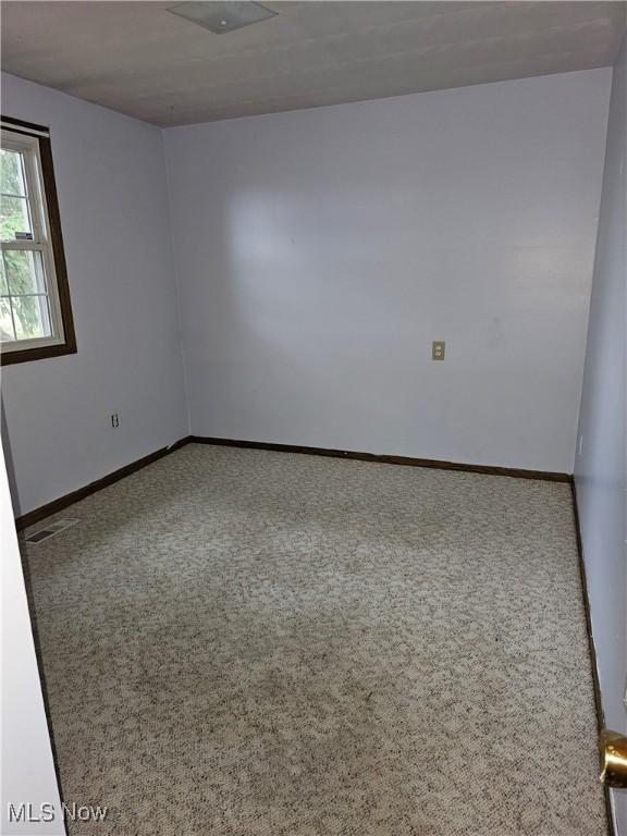 empty room with carpet floors