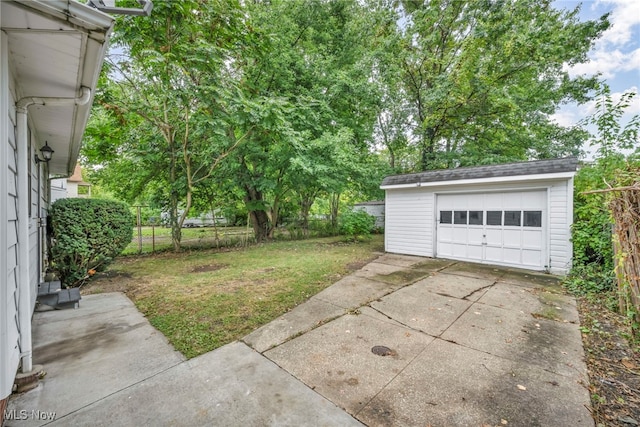 garage featuring a yard