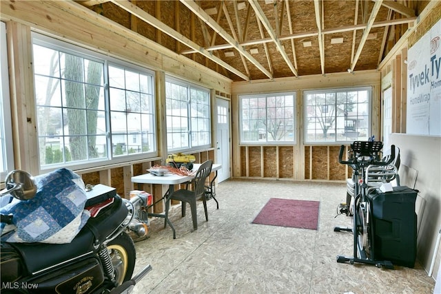 sunroom / solarium featuring a healthy amount of sunlight