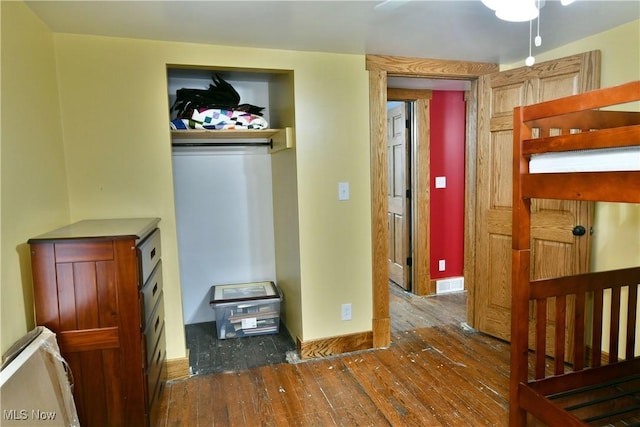 bedroom featuring dark hardwood / wood-style floors