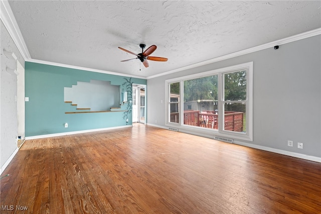 unfurnished living room with hardwood / wood-style flooring, ceiling fan, crown molding, and a textured ceiling